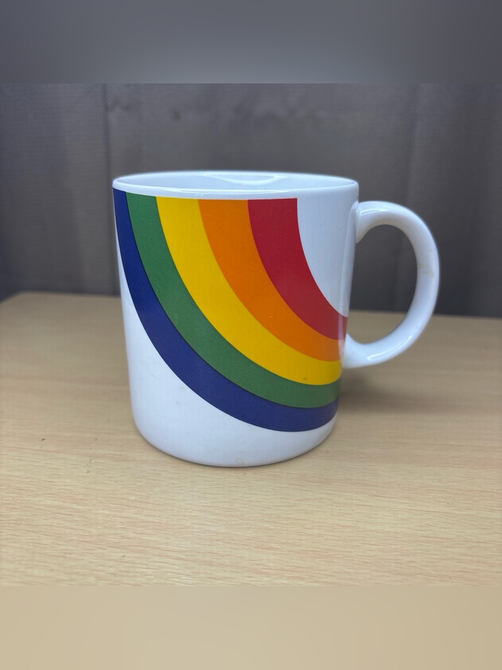 White Ceramic Mug with Rainbow Arc Design